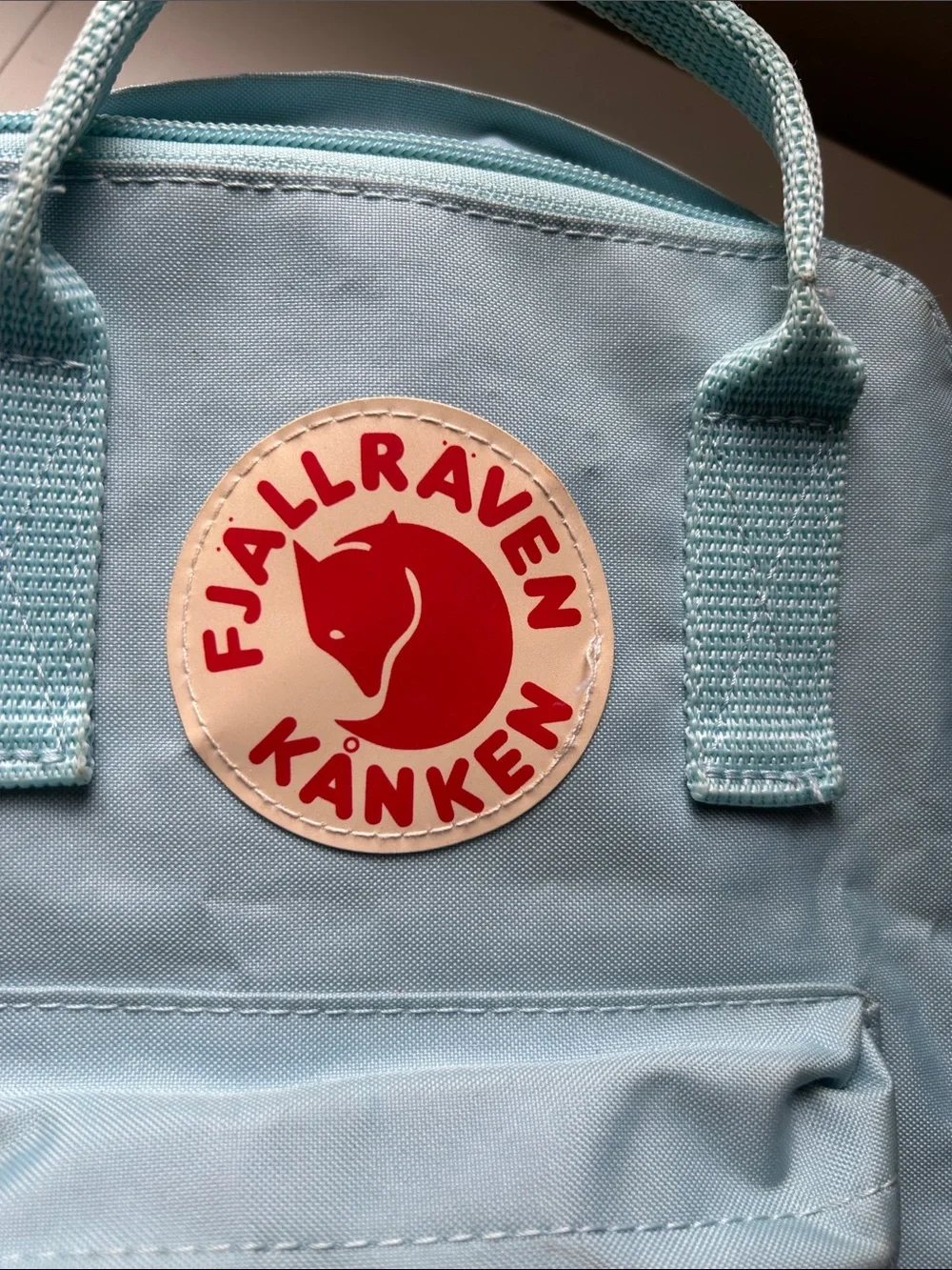 Fjallraven Kånken Mini Backpack in Light Blue with Red Logo